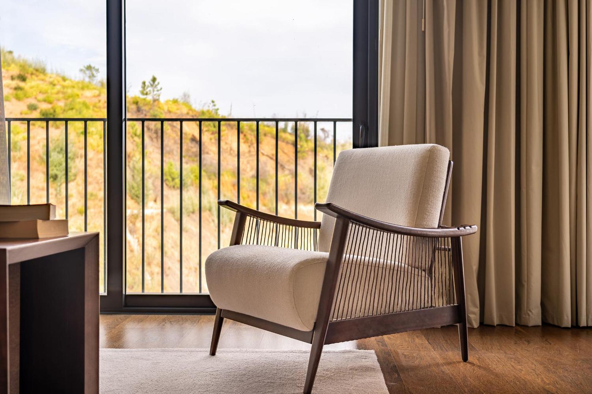 Monchique Resort & Spa Exteriör bild A chair with a woven back