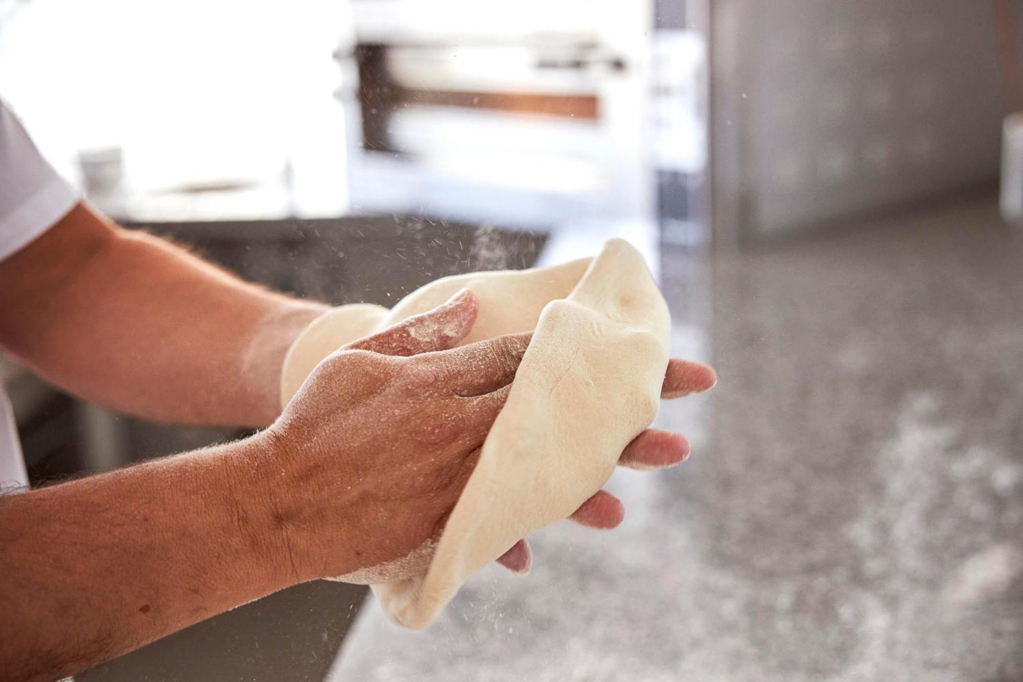 Monchique Resort & Spa Exteriör bild A baker kneading bread dough